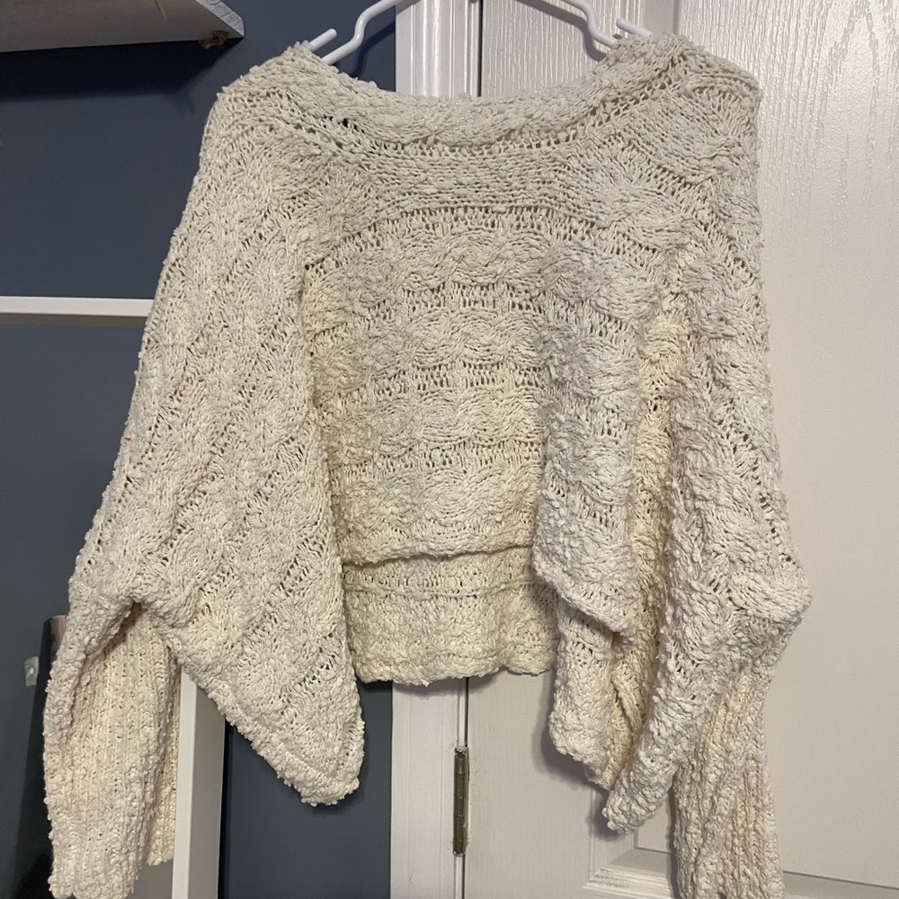 Cream colored, cropped sweater